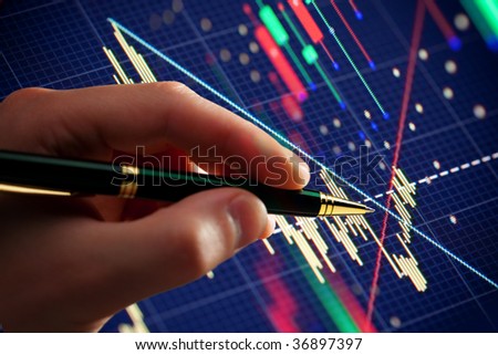 ?hart on computer monitor, market\'s climbing, hand and pen pointer