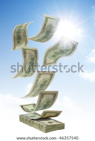 stock photo : falling dollars to stack, isolated on blue sky