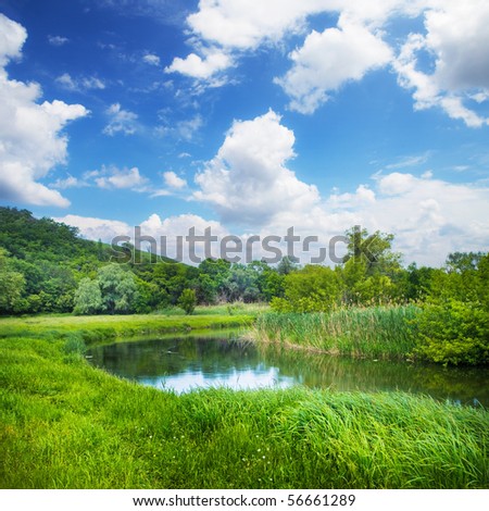 summer landscape with river and blue sky