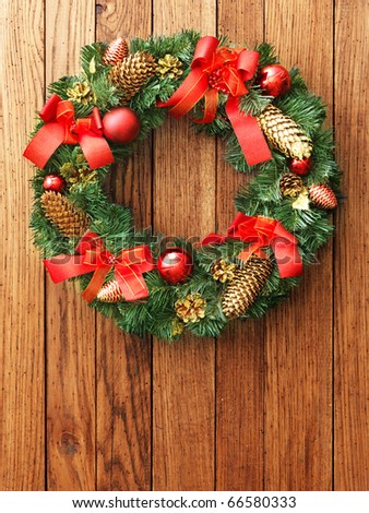 Christmas wreath on the wood door