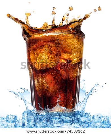 glass with cola and ice  in water splash