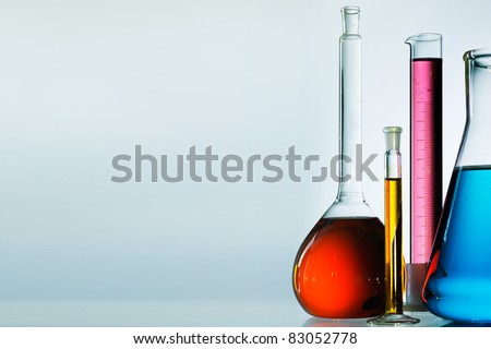 Assorted laboratory glassware equipment ready for an experiment in a science research lab Assorted laboratory glassware equipment ready for an experiment in a science research lab