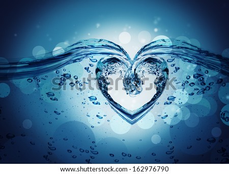 Heart from water splash with bubbles isolated on white