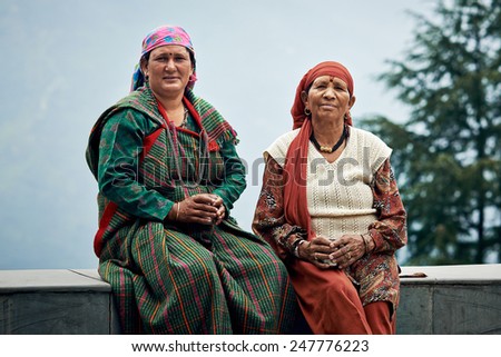 NAGGAR, INDIA - JULY 17: Typical local Indian women of North India in traditional clothing for the north on July 17, 2013. Naggar, Kullu Valley, Himachal Pradesh, India.