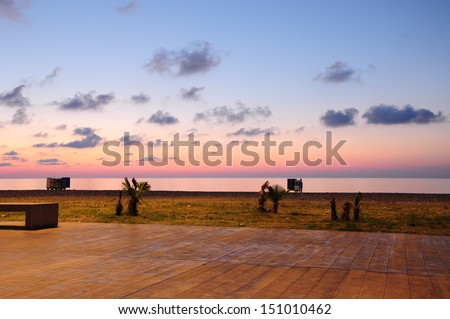 Batumi seaside boulevard in vivid sunset colors