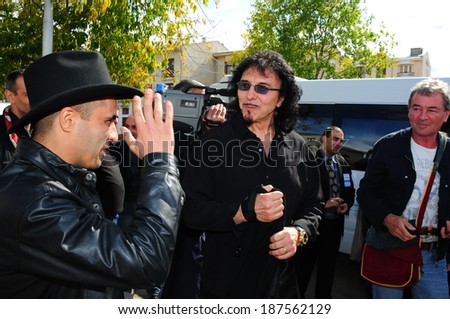 SPITAK, ARMENIA - OCTOBER 1: Tony Iommi and Ian Gillan among their fans on October 1, 2009 in Spitak, Armenia. They visit Armenia within the framework of “Armenia Grateful 2 Rock” project.