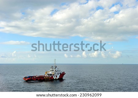 An offshore supply boat transporting people between platform