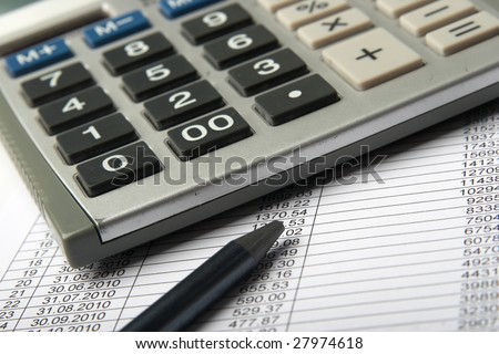 The calculator, the pencil consisting of one slate pencil, credit payment plan - as a financial planning symbol