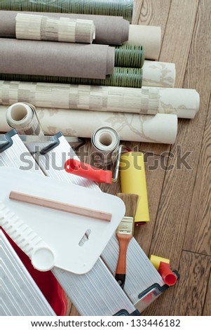 still life from tools for wall-paper and wall-paper