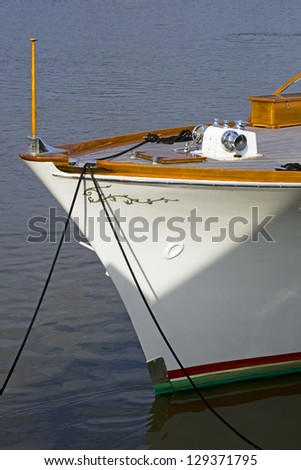 Bow of yacht docked along River Street in Savannah, Georgia, USA.