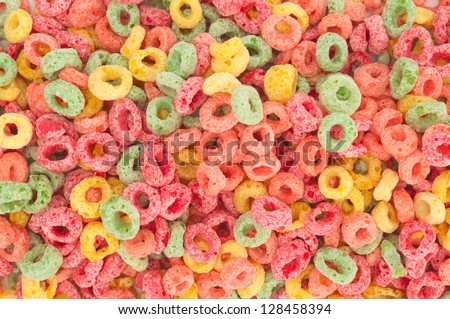 Background with a group of colorful kids fruity cereal.