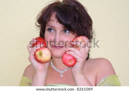 Woman power in the hands of 4 apples.