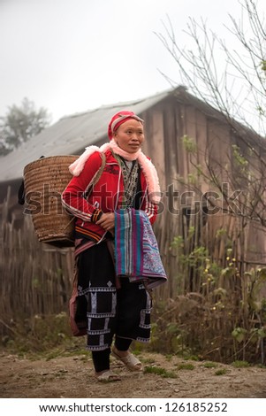 SAPA, VIETNAM - FEB 11: Unidentified women from the Red Dao Ethnic Minority People on  February 11, 2012 in Sapa, Vietnam. Red Dao Minority are the 9th largest ethnic group in Vietnam