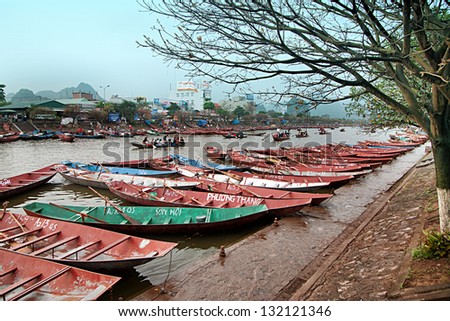 HANOI, VIETNAM - MARCH 2: Tourist boat parking at the HUONG pagoda Vietnam in 2 March 2013. HUONG pagoda Festival is the biggest and longest annual festival in VIETNAM.
