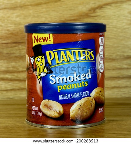 SPENCER , WISCONSIN June 22 , 2014:  can of Planters Smoked Peanuts. Planters is an American snack food company, a division of Kraft foods.