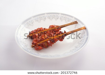 Grilled chicken skewers on plate.Easy breakfast for Thailand