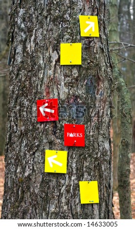 Yellow and red trail markers to guide hikers.