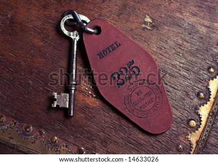 closeup of a vintage hotel room skeleton key.