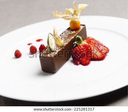 Italian brown chocolate dessert with strawberry