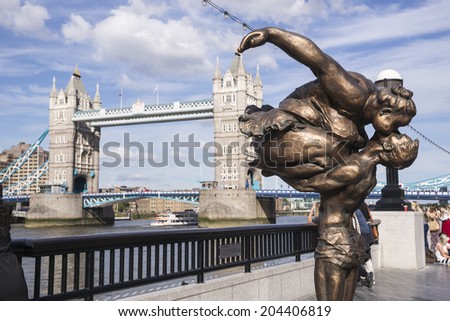 LONDON, UK - JUNE 7: Chinese Sculptures of Women Pop Up in London.These sculptures arrived as part of Chubby Women a two-week outdoor exhibit by Chinese sculptor Xu Hongfei in London on June 7, 2014