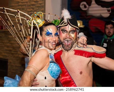 SITGES, SPAIN - FEBRUARY 15, 2015: Sitges Carnival\'s Carnestoltes, a couple in a costume in the \'Disbauxa\' Parade celebrated on February 15, 2015 in Sitges, Spain.