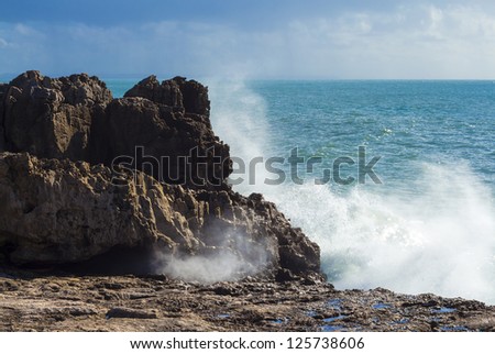 View of a wave breakers at the rocks