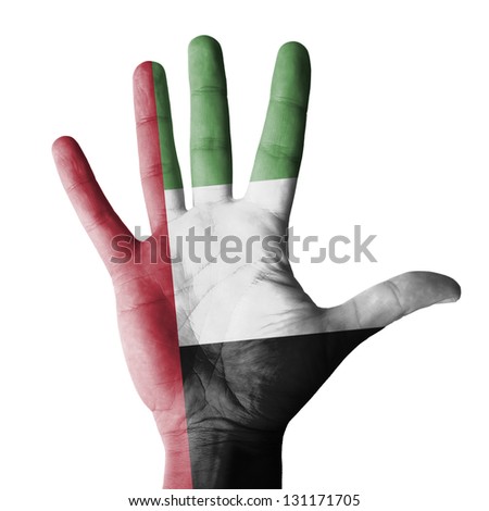 Open hand raised, multi purpose concept, United Arab Emirates (UAE) flag painted - isolated on white background