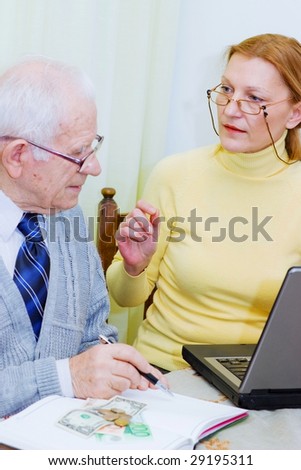 Senior client talking with woman agent