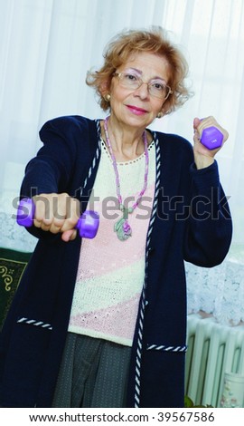 Beautiful senior woman exercise at home