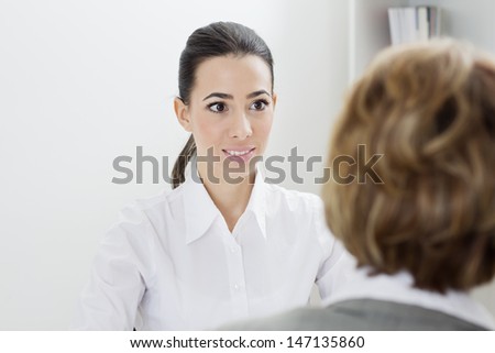 Young woman having a job interview.
