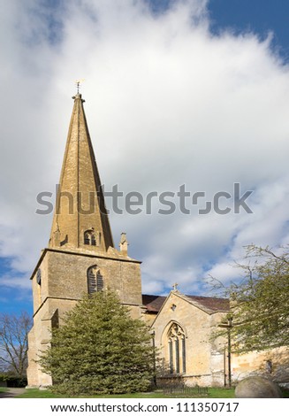 old church in the countryside with blue sky and clouds