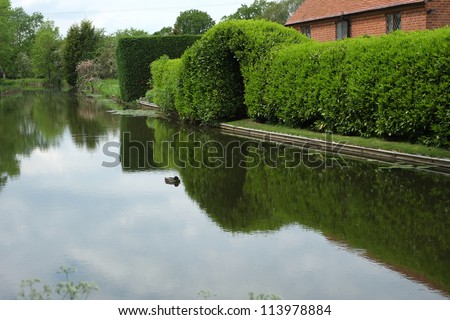 A narrow boat on the Stratford upon avon canal, Preston Bagot flight of locks, Warwickshire, Midlands England UK.
