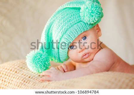 Cute Baby Knit Hats on Portrait Of Cute Newborn Baby In A Funny Knitted Hat Stock Photo