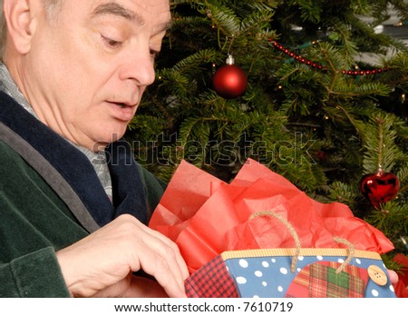 Mature Man with Christmas Gift