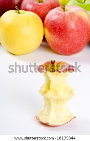 One Royal Gala Apple Core in Front of Bunch of Apples
