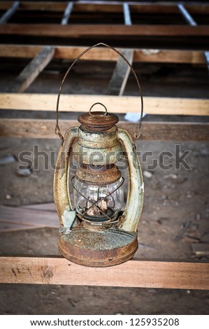 old rusty kerosene lamp