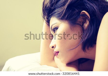 close up Asia women face lying on bed in room, beauty concept, , vintage style