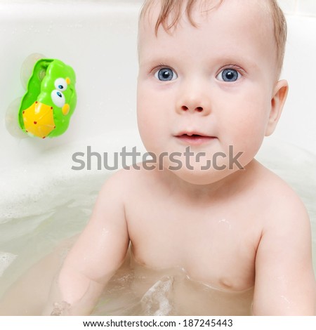Portrait of funny baby in bath