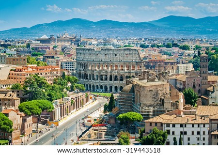 Aerial cityscape of Rome with Forums and Colosseum, Rome, Italy