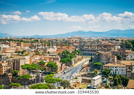 Aerial cityscape of Rome with Forums and Colosseum, Rome, Italy