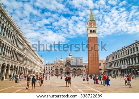 VENICE, ITALY - SEPTEMBER 09, 2015: Piazza San Marco with the Basilica of Saint Mark and the bell tower of St Mark\'s Campanile (Campanile di San Marco) in Venice, Italy, September 09, 2015.