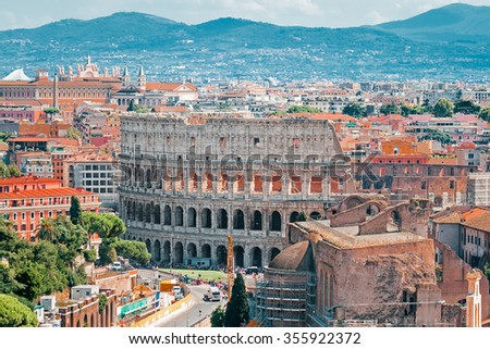 Aerial cityscape of Rome with Forums and Colosseum, Rome, Italy