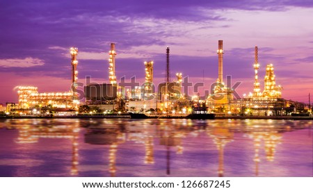 Petroleum oil refinery factory over sunrise in Bangkok, Thailand