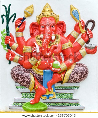 India God Ganesha or God of success  image in stucco low relief technique at Wat Samarn temple,Chachoengsao,Thailand.This is traditional and generic style in Thailand. No any trademark in this photo.