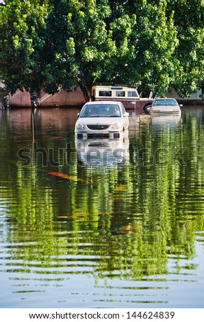 BANGKOK, THAILAND - NOV 12:  flooded cars on Jaransanitwong Road during the worst flooding  on November 12, 2011 in Bangkok, Thailand