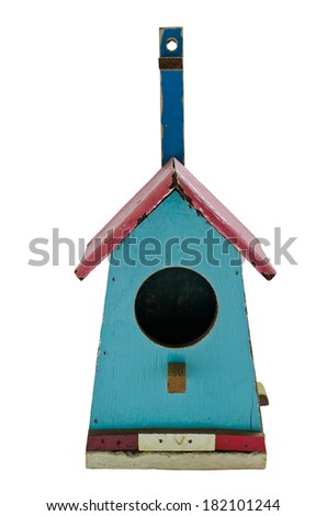 Colorful wooden bird house with hole on white background, clipping path included.