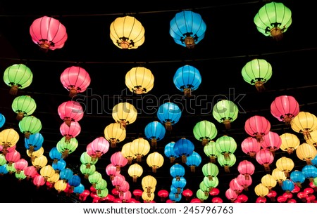 Chinese lanterns hanging in street at night during the Chinese New Year