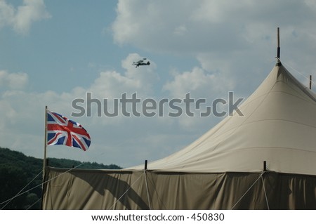 army tent with english flag,plane on sky