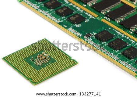 Computer RAM modules and CPU unit on a white background