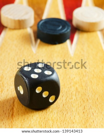 Backgammon table ,dice and pieces (closeup image)